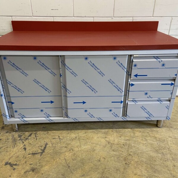 Stainless steel cutting table with sliding doors and drawers